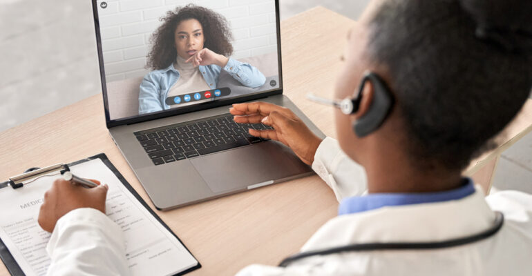 African,Doctor,Wear,Headset,Consult,Female,Black,Patient,Make,Online