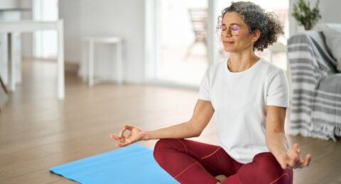 Happy,Healthy,Middle,Aged,Woman,Meditating,At,Home.,Serene,Mindful